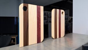 Finished maple, walnut, and cherry charcuterie boards from our beginner woodworking class in Langley, BC.