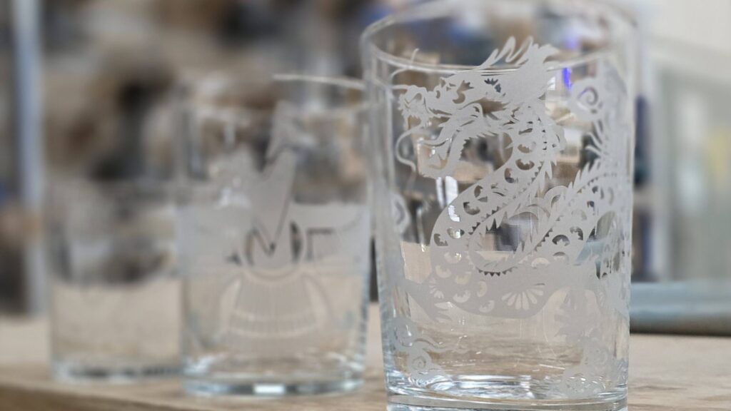 Glassware set etched with Armor Etch Glass Etching Cream using a stencil cut on a Professional 24-inch vinyl plotter at Maker Cube (Langley, BC)